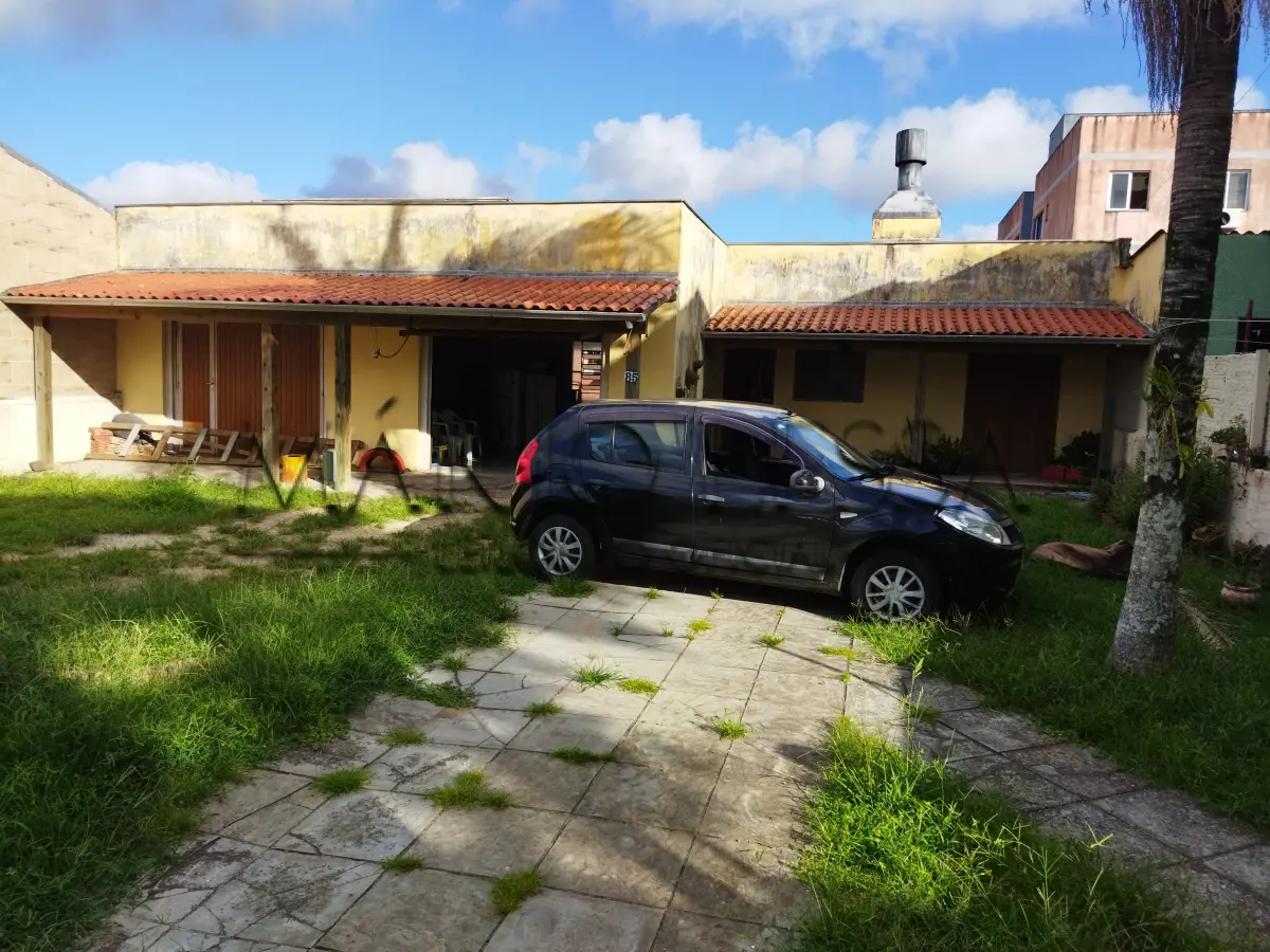 LOTE 006 - OSÓRIO. Terreno com casa no Bairro Albatroz.