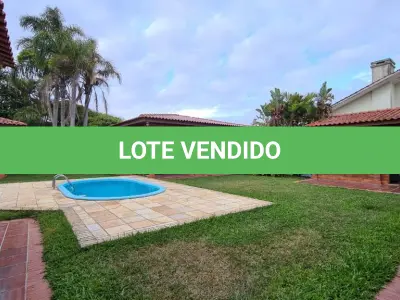 LOTE 001 - Atlântida. Casa de esquina próximo ao mar