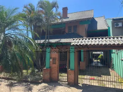 LOTE 001 - Um sobrado no bairro Rio Branco, Canoas